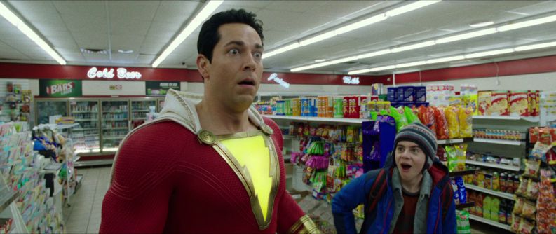 Shazam and Freddy look on in amazement as they realise the former is bullet proof