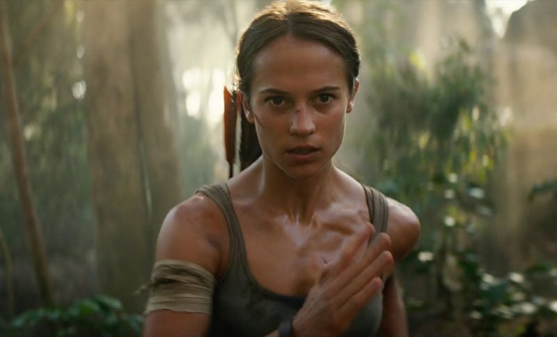 Alicia Vikander as Tomb Raider running toward her enemies